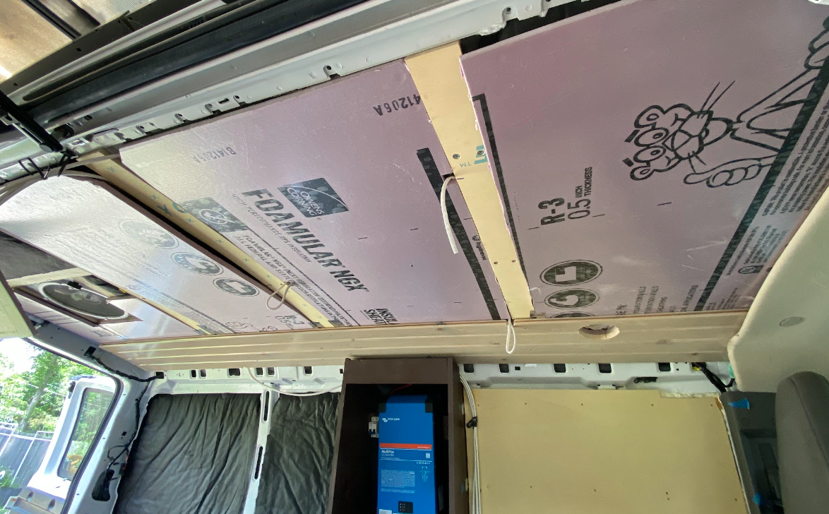 The same view as above, but with finished boards across the far end portion of the ceiling.