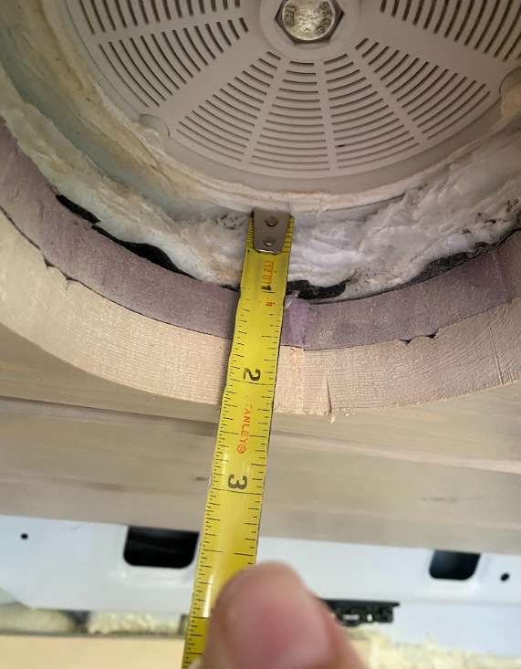 Measuring the depth of vent duct needed: about 2.25 inches.